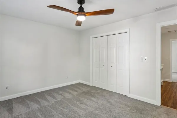 an empty room with fan