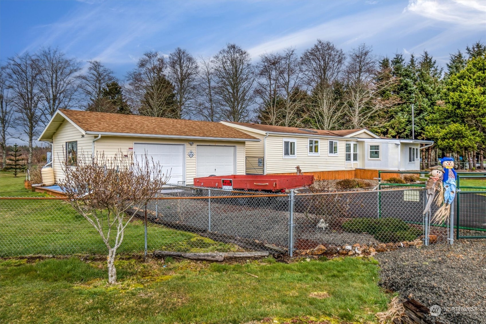 3901 67th Place Long Beach, WA 98631 - Photo 1 of 25 a view of house with a yard and hanging chair