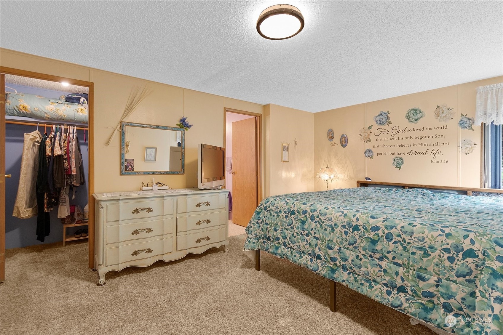 3901 67th Place Long Beach, WA 98631 - Photo 12 of 25 a bedroom with a bed and a cabinets