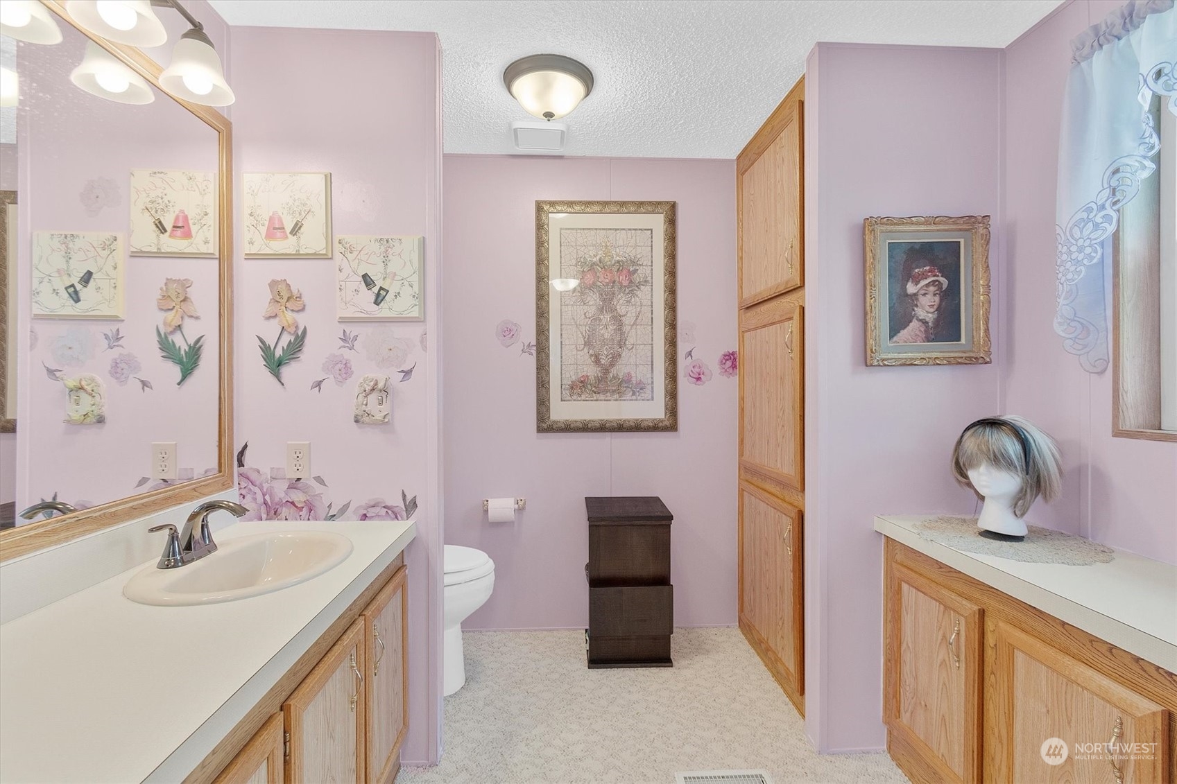 3901 67th Place Long Beach, WA 98631 - Photo 13 of 25 a bathroom with a sink a toilet and shower