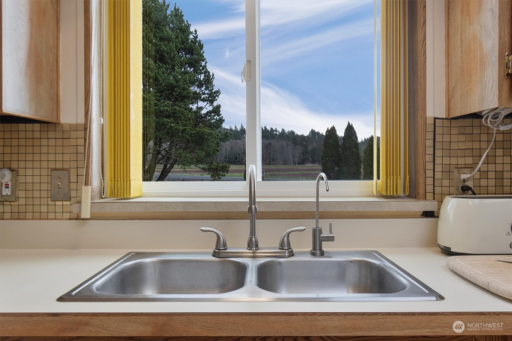 3901 67th Place Long Beach, WA 98631 - Photo 17 of 25 a close view of sink and tap