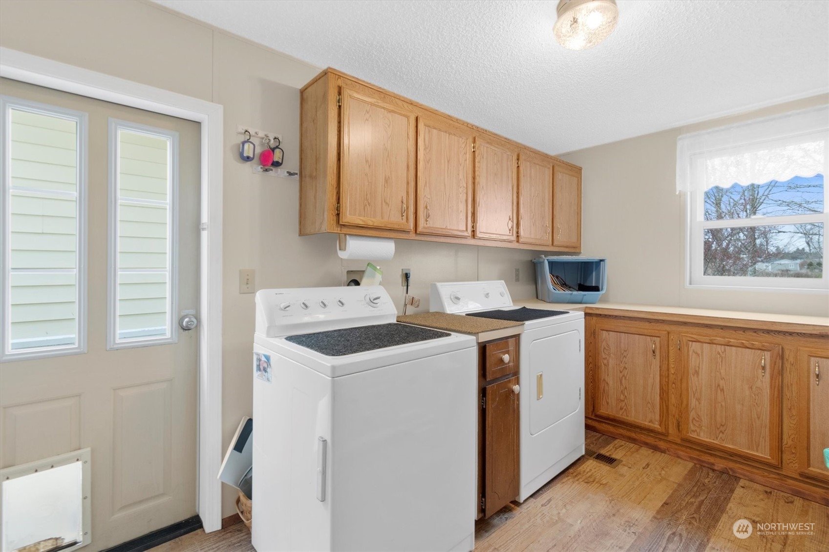 3901 67th Place Long Beach, WA 98631 - Photo 24 of 25 a kitchen with a sink cabinets and window