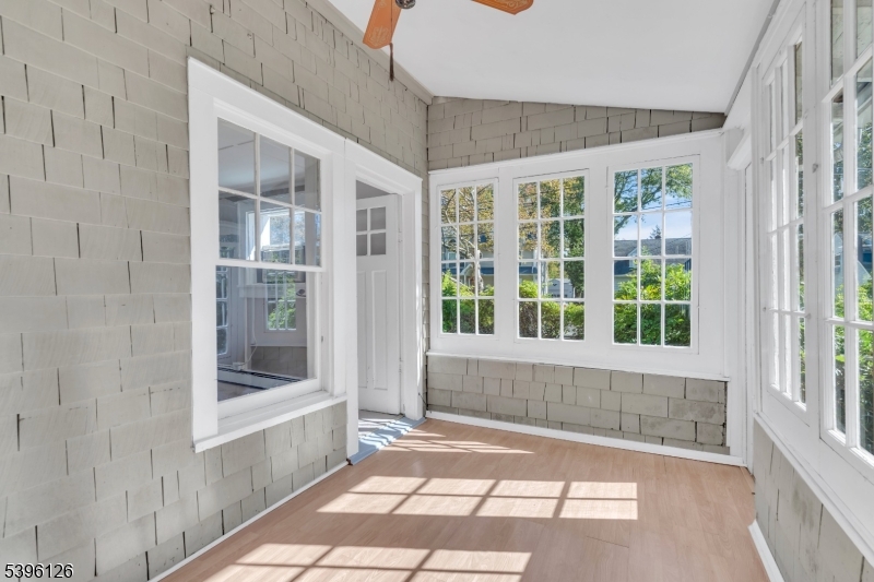 11 Maclennan Place, Unit A Fanwood, NJ 07023 - Photo 12 of 23 a view of a bathroom with a tub and windows