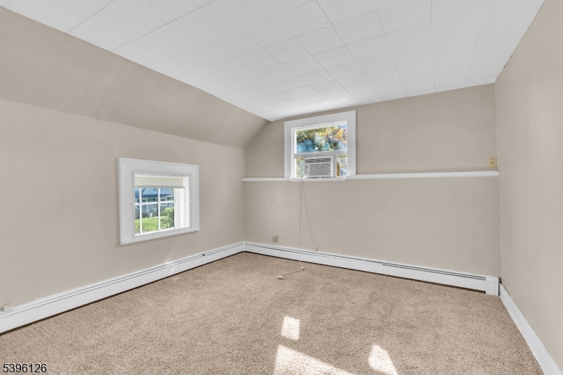 11 Maclennan Place, Unit A Fanwood, NJ 07023 - Photo 17 of 23 an empty room with windows