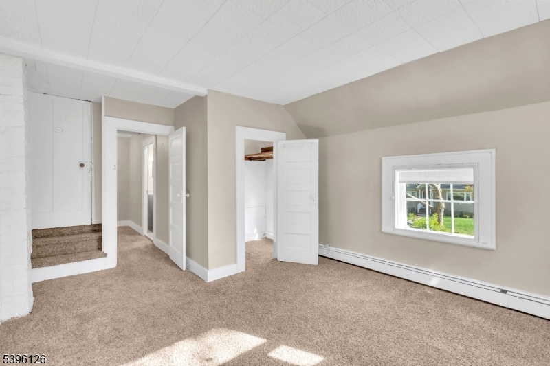 11 Maclennan Place, Unit A Fanwood, NJ 07023 - Photo 18 of 23 a view of an empty room with a window