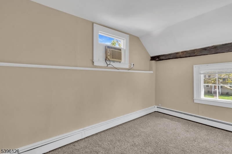 11 Maclennan Place, Unit A Fanwood, NJ 07023 - Photo 19 of 23 a view of an empty room with a window