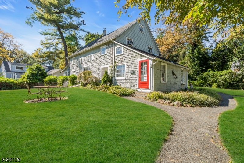 11 Maclennan Place, Unit A Fanwood, NJ 07023 - Photo 23 of 23 a view of a house with backyard and garden