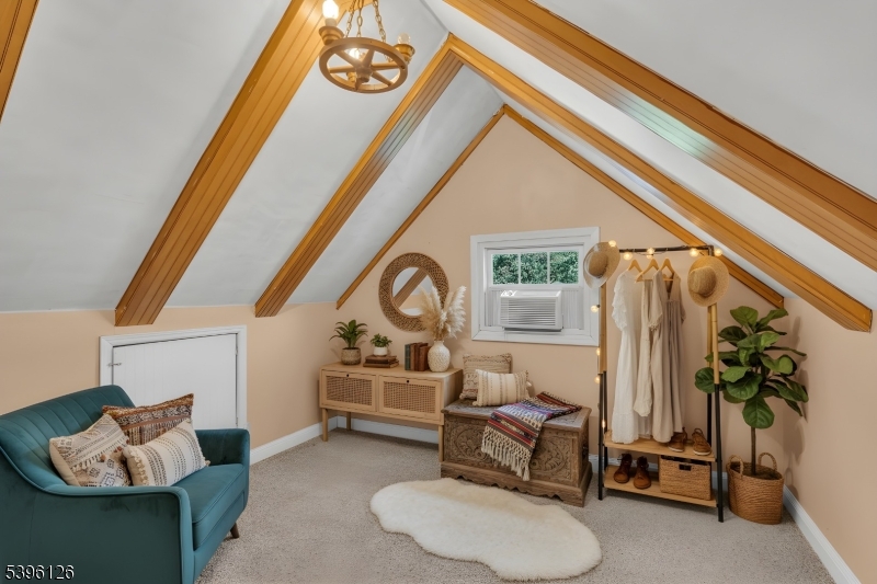11 Maclennan Place, Unit A Fanwood, NJ 07023 - Photo 5 of 23 a living room with furniture and a potted plant