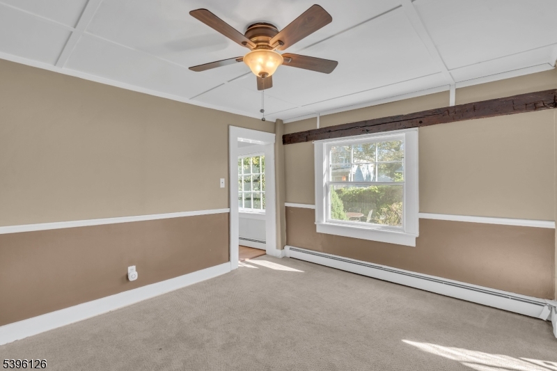 11 Maclennan Place, Unit A Fanwood, NJ 07023 - Photo 8 of 23 a view of an empty room with a window