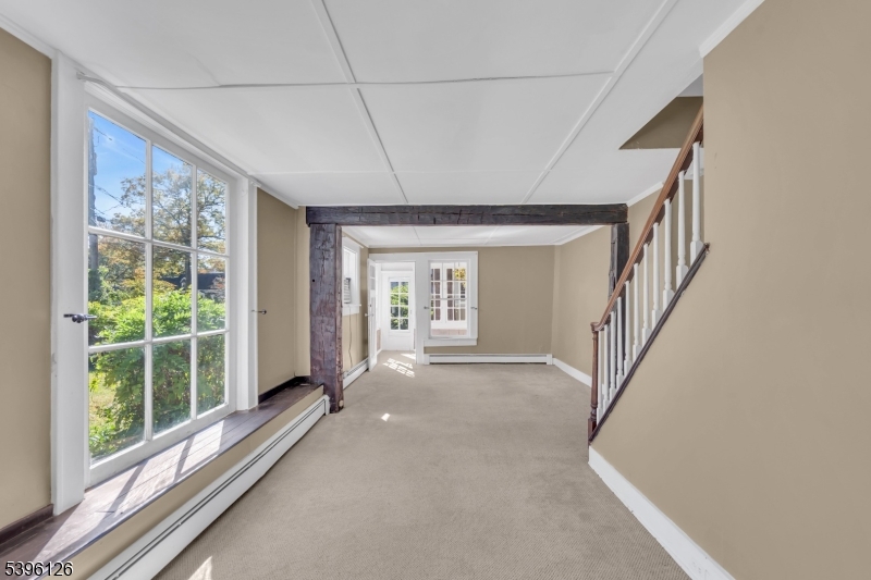 11 Maclennan Place, Unit A Fanwood, NJ 07023 - Photo 9 of 23 a view of hallway with windows