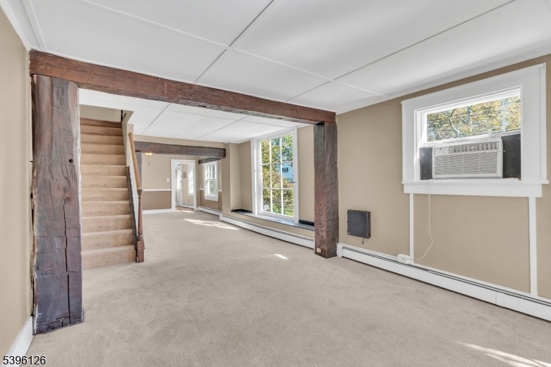 11 Maclennan Place, Unit A Fanwood, NJ 07023 - Photo 10 of 23 an empty room with windows