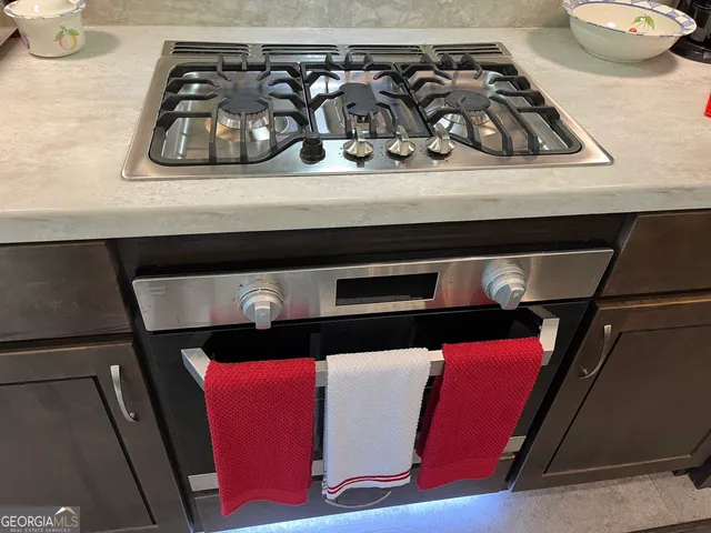 a bedroom with a bed and a microwave