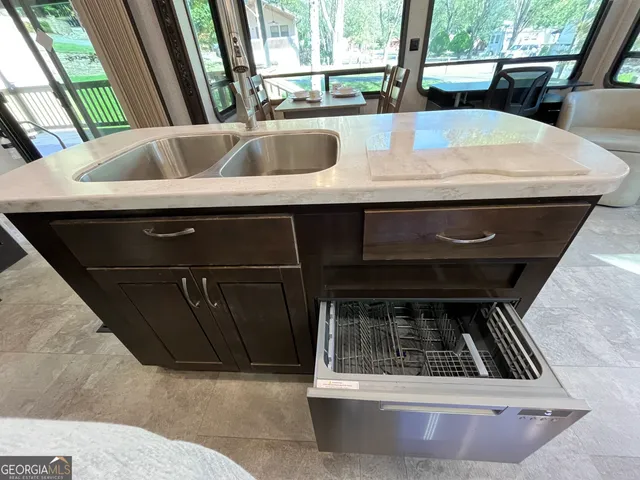 a view of a swimming pool with a yard