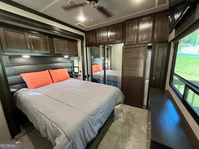 a view of outdoor space with a table and chairs