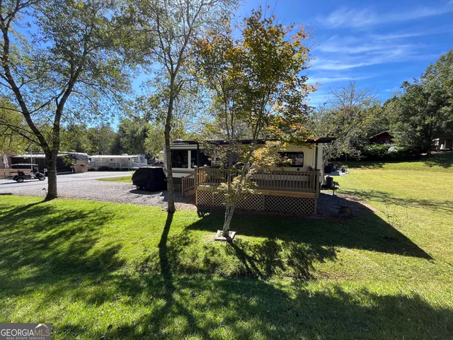 a street sign that is on a brick wall