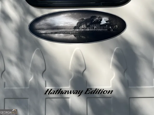 a view of a two chairs in the patio