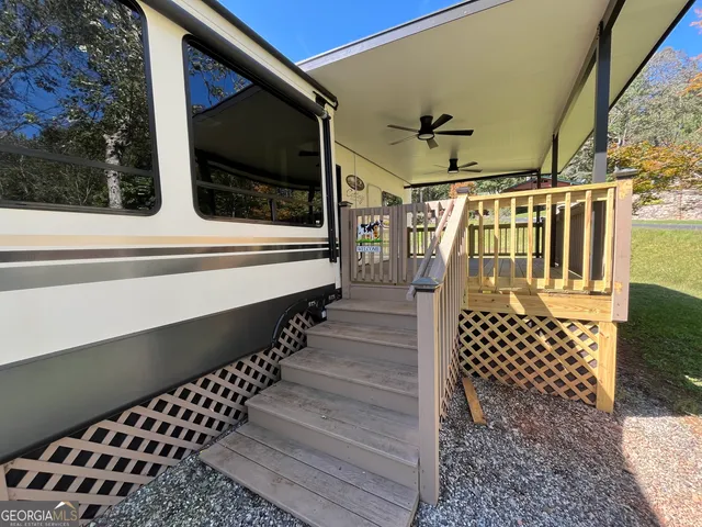 a view of swimming pool with seating space