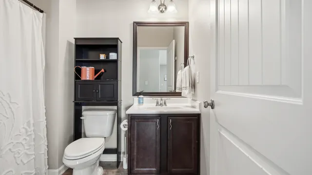 a bathroom with a bathtub and shower