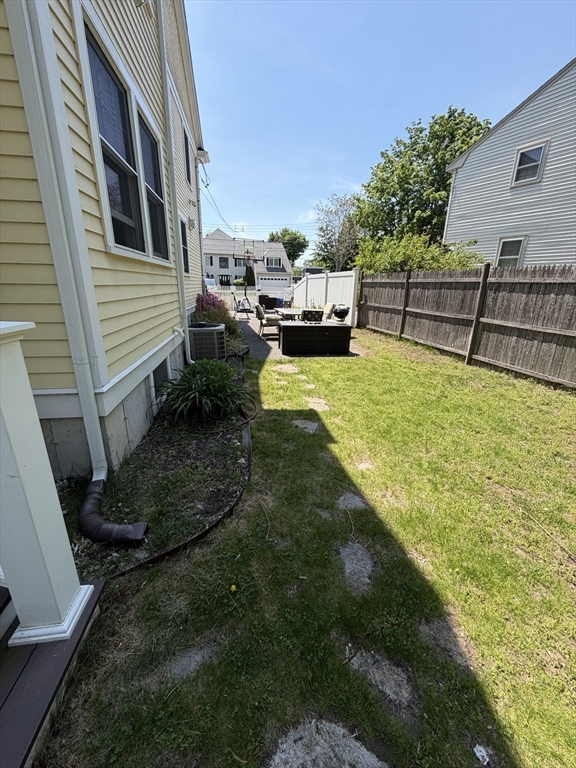 17 Cardinal Street, Unit 17 Winchester, MA 01890 - Photo 41 of 42 a view of a backyard with sitting area