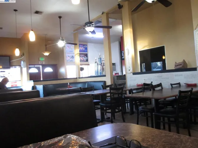 a storage room with furniture and clutter