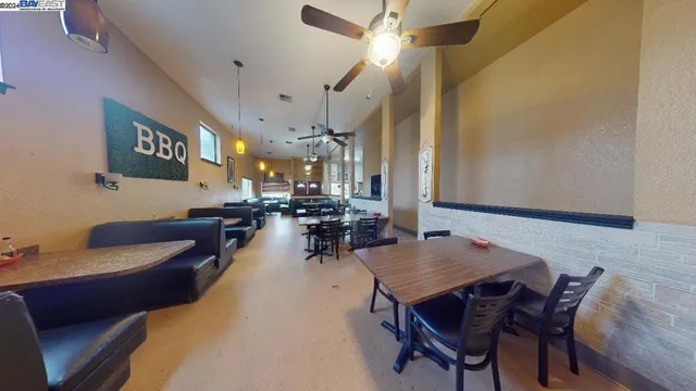 a bathroom with a glass door shower and a sink
