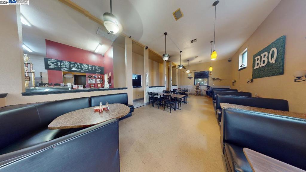 421 Maze Boulevard Modesto, CA 95351 - Photo 28 of 30 a large kitchen with a table and chairs