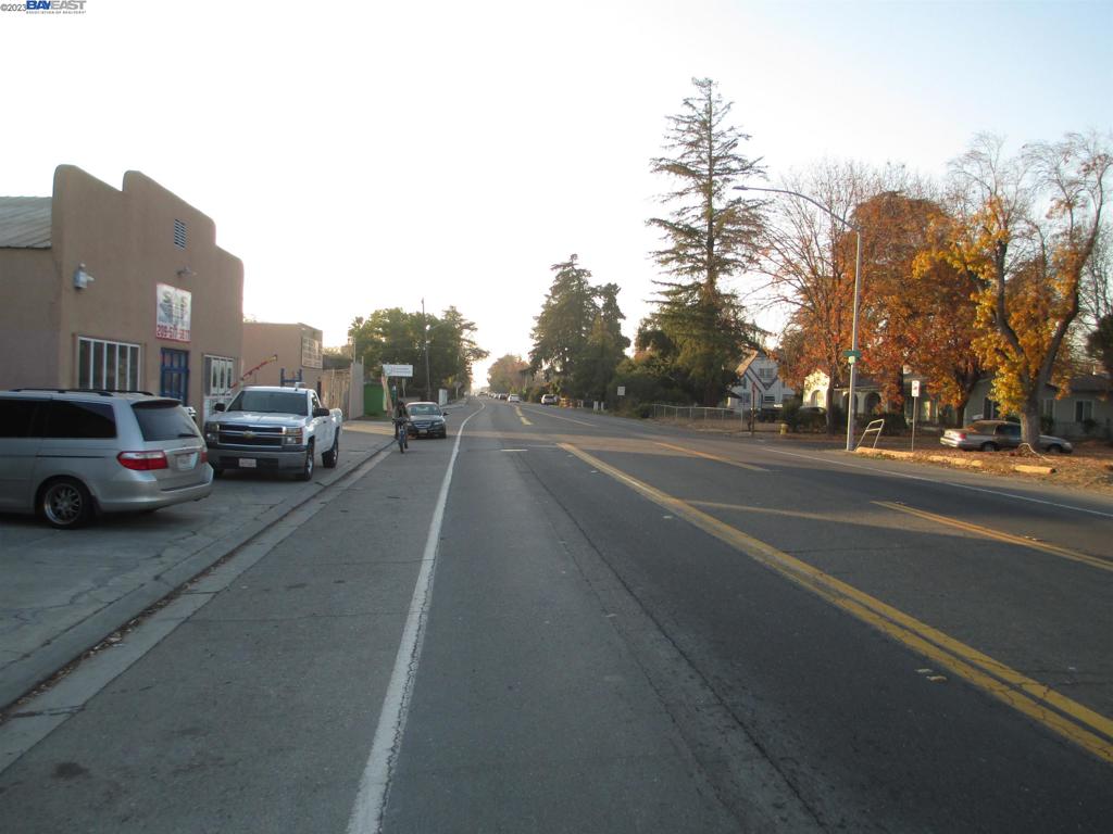 421 Maze Boulevard Modesto, CA 95351 - Photo 9 of 30 a view of a city street with a cars side of the road