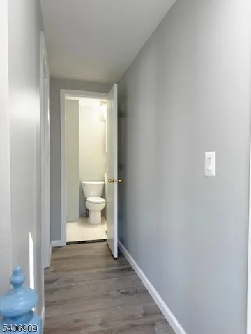 a view of a bathroom with toilet