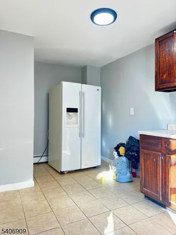 a view of a storage & utility room with wooden floor