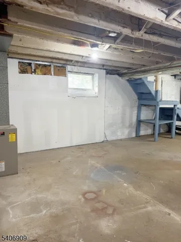 a kitchen with stainless steel appliances granite countertop a sink and a stove