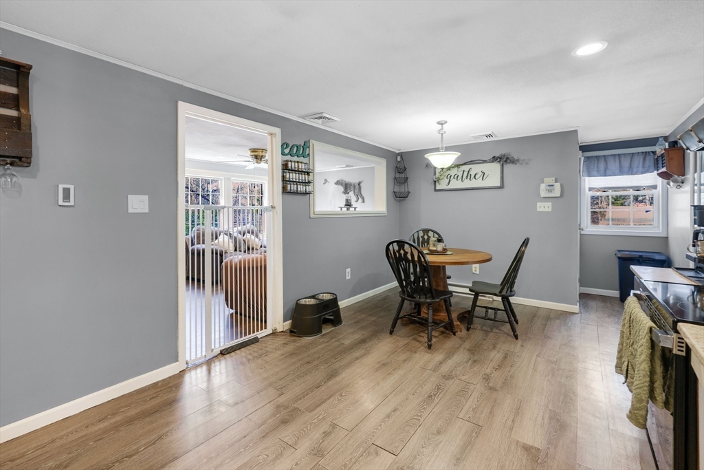 295 Burlingame Road Palmer, MA 01069 - Photo 11 of 31 a view of a dining room with furniture and wooden floor