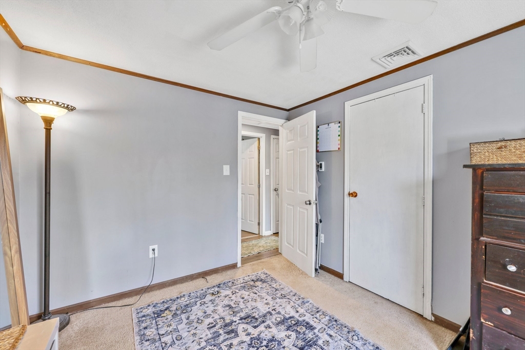 295 Burlingame Road Palmer, MA 01069 - Photo 17 of 31 a view of a hallway with a wooden floor