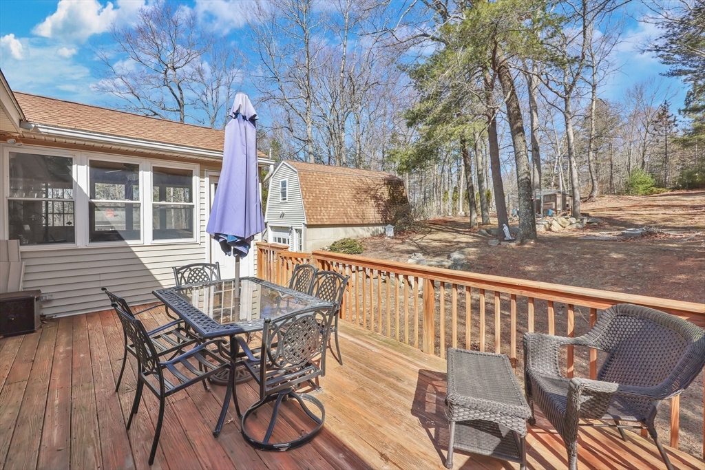 295 Burlingame Road Palmer, MA 01069 - Photo 23 of 31 a view of a chairs and table on the deck