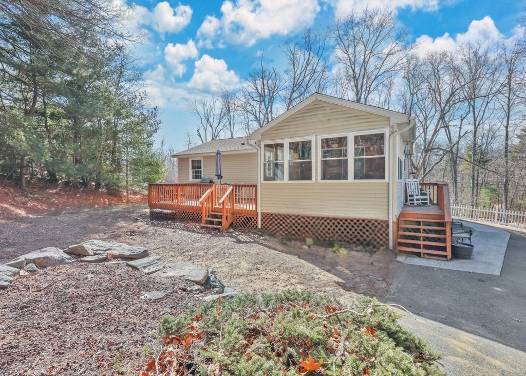 295 Burlingame Road Palmer, MA 01069 - Photo 3 of 31 a front view of a house with a yard