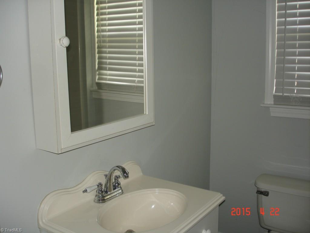 145 Butner Road King, NC 27021 - Photo 22 of 30 LL full bath with large walk-in shower. New fixtures, flooring & paint.
