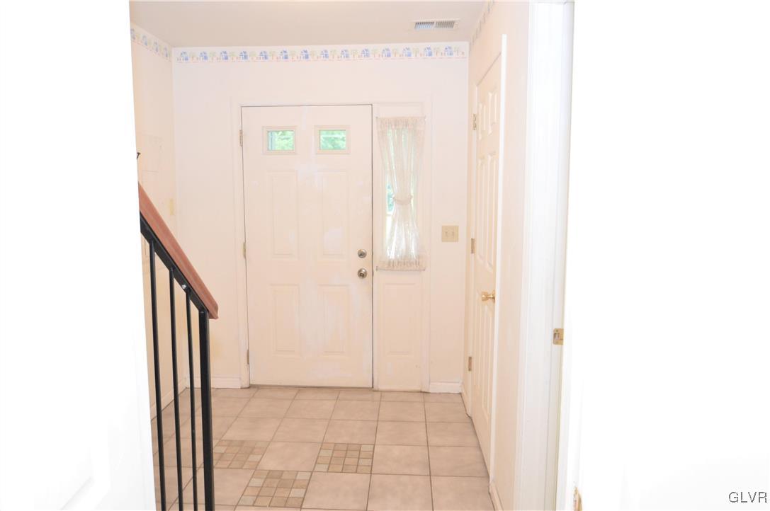 308 Mickley Road Whitehall, PA 18052 - Photo 2 of 43 a view of a hallway with wooden floor