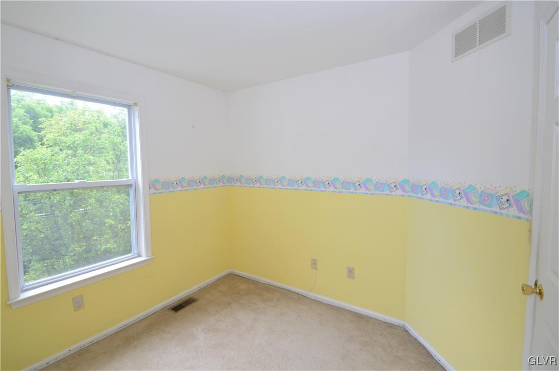 308 Mickley Road Whitehall, PA 18052 - Photo 21 of 43 a view of an empty room and window