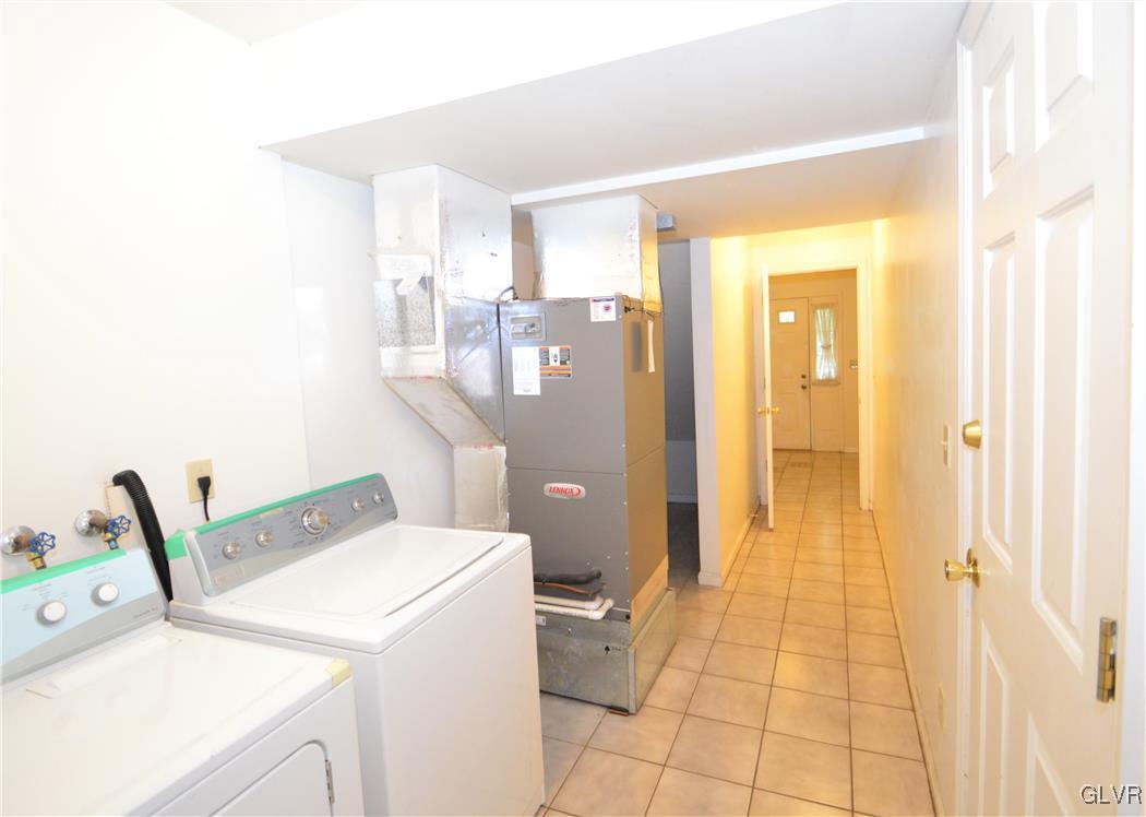 308 Mickley Road Whitehall, PA 18052 - Photo 5 of 43 a bathroom with a sink and a mirror