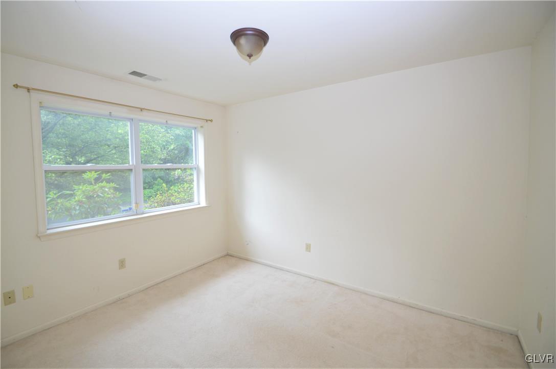 308 Mickley Road Whitehall, PA 18052 - Photo 6 of 43 an empty room with a window