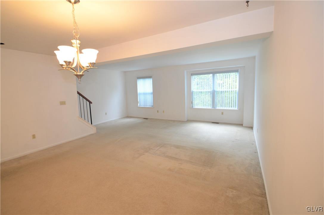 308 Mickley Road Whitehall, PA 18052 - Photo 9 of 43 a view of a chandelier fan and windows