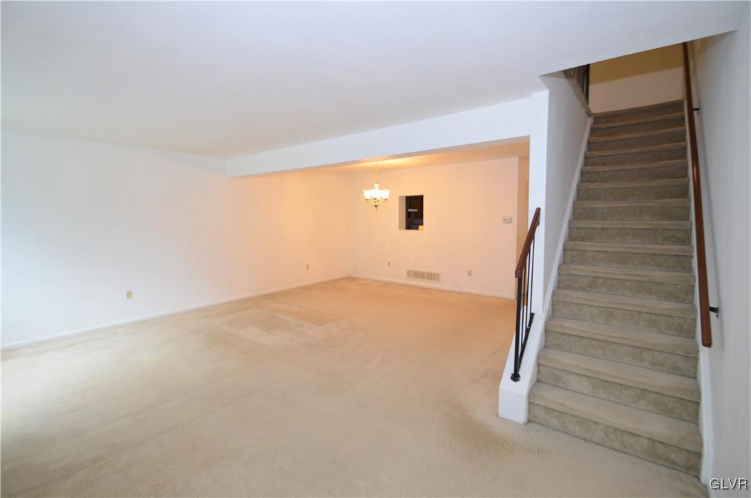 308 Mickley Road Whitehall, PA 18052 - Photo 10 of 43 a view of an empty room with stairs