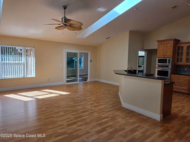 a bathroom with a sink and a microwave