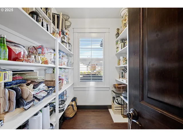 a kitchen with stainless steel appliances granite countertop a refrigerator and a stove