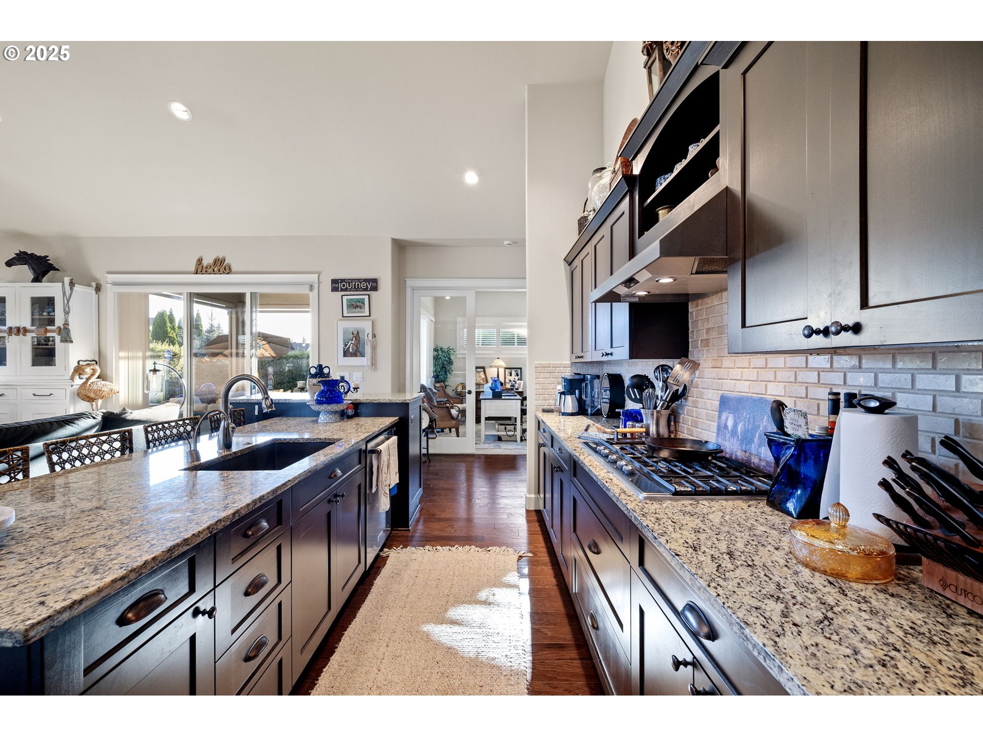 1765 Trevino Road Creswell, OR 97426 - Photo 12 of 26 a kitchen with stainless steel appliances granite countertop sink stove top oven and cabinets