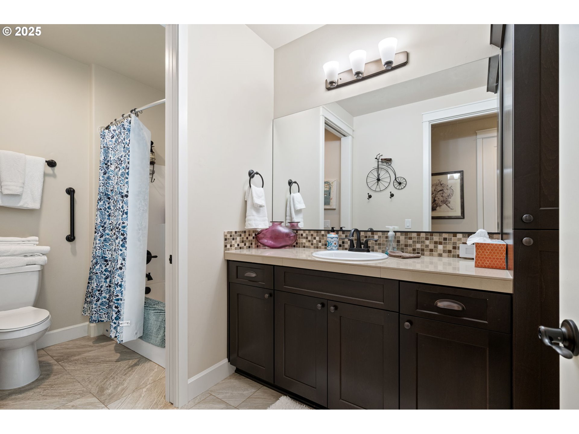 1765 Trevino Road Creswell, OR 97426 - Photo 16 of 26 a bathroom with a sink and a mirror
