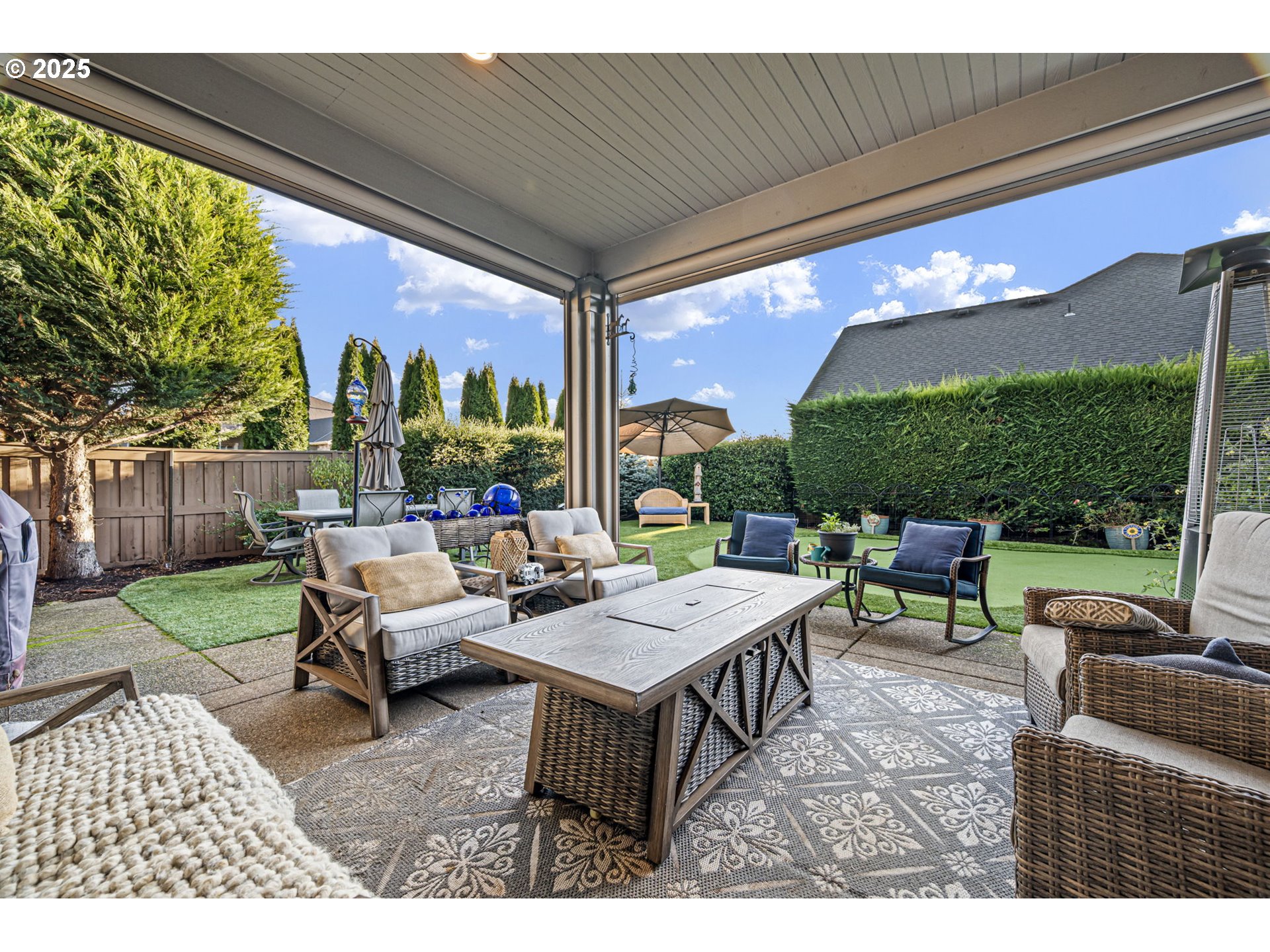 1765 Trevino Road Creswell, OR 97426 - Photo 2 of 26 a backyard of a house with a table and chairs