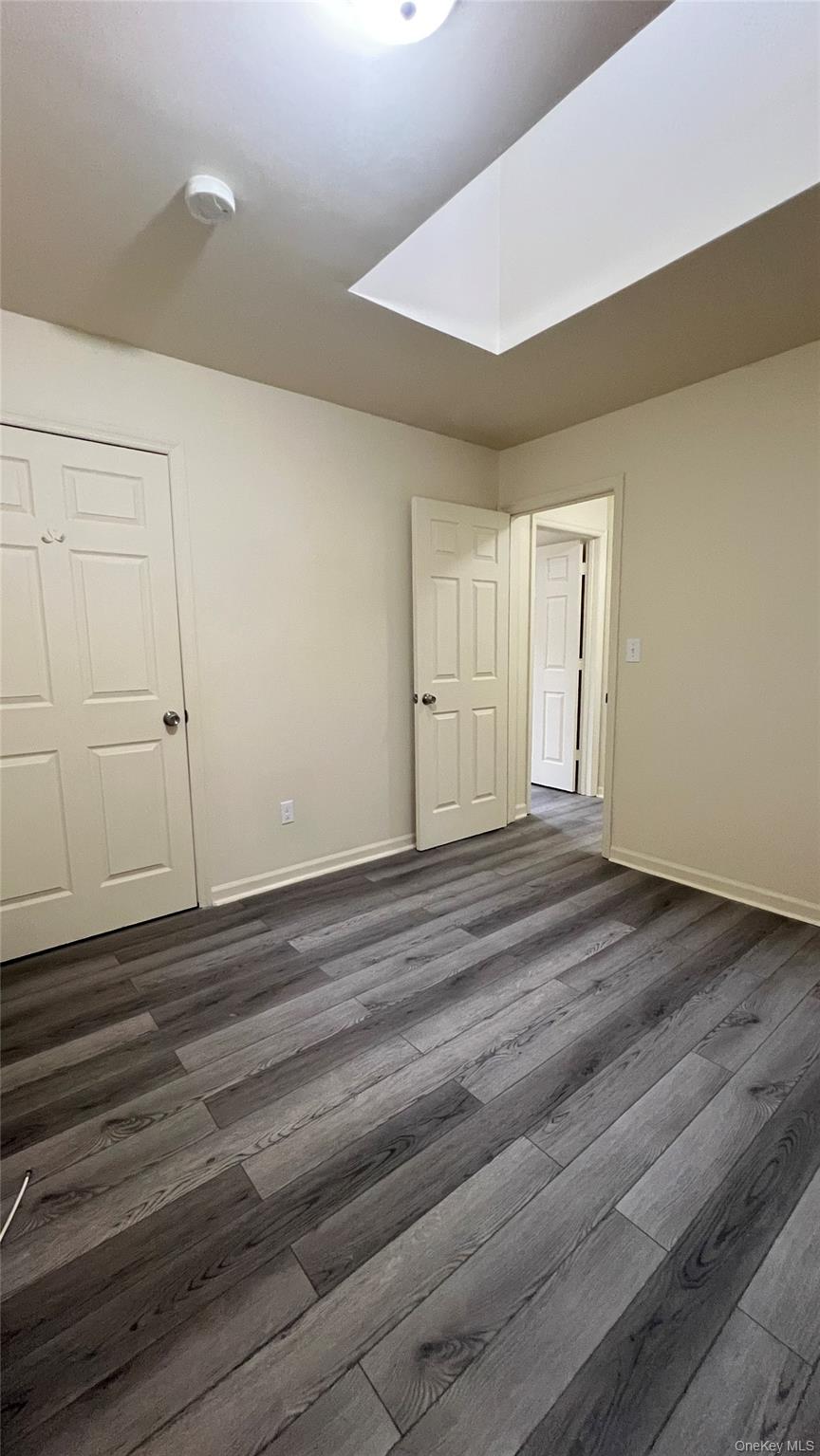 27 East Main Street, Unit 6 Beacon, NY 12508 - Photo 8 of 15 Bedroom 1 featuring wood-style finished floors and baseboards