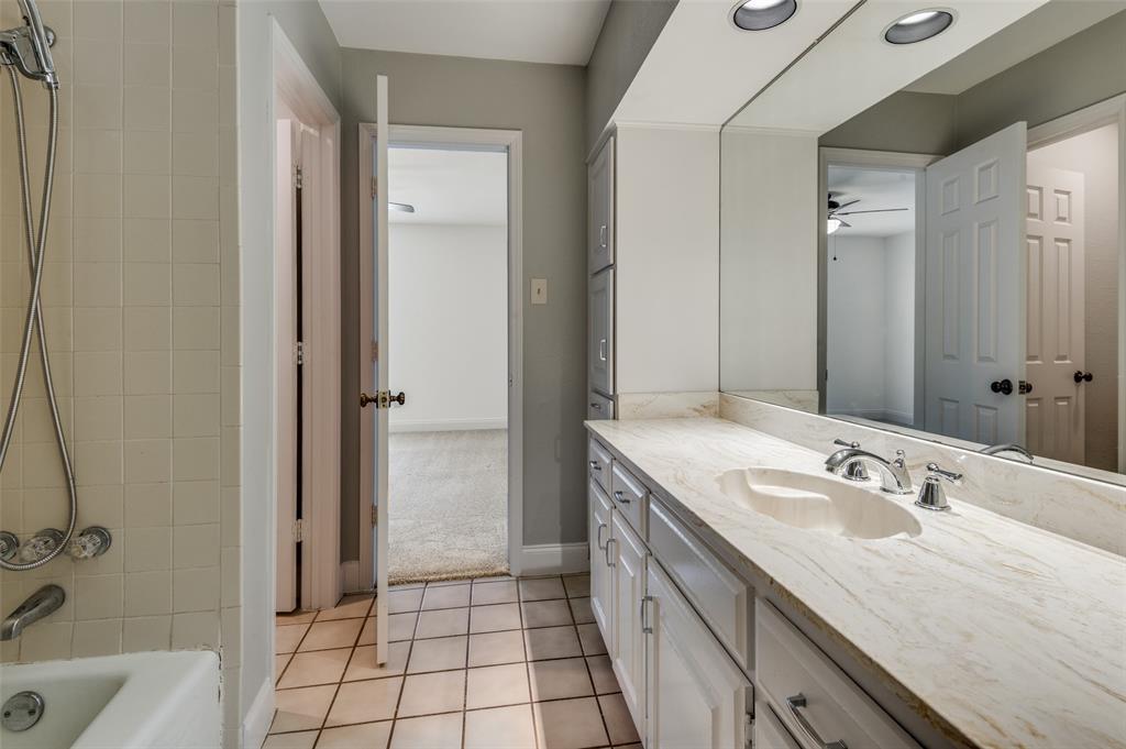 737 Newport Road Fort Worth, TX 76120 - Photo 25 of 37 Jack and Jill Bathroom