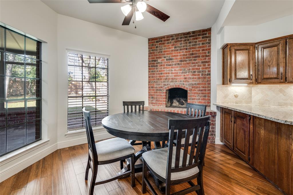 737 Newport Road Fort Worth, TX 76120 - Photo 4 of 37 Cozy Breakfast Room with raised hearth