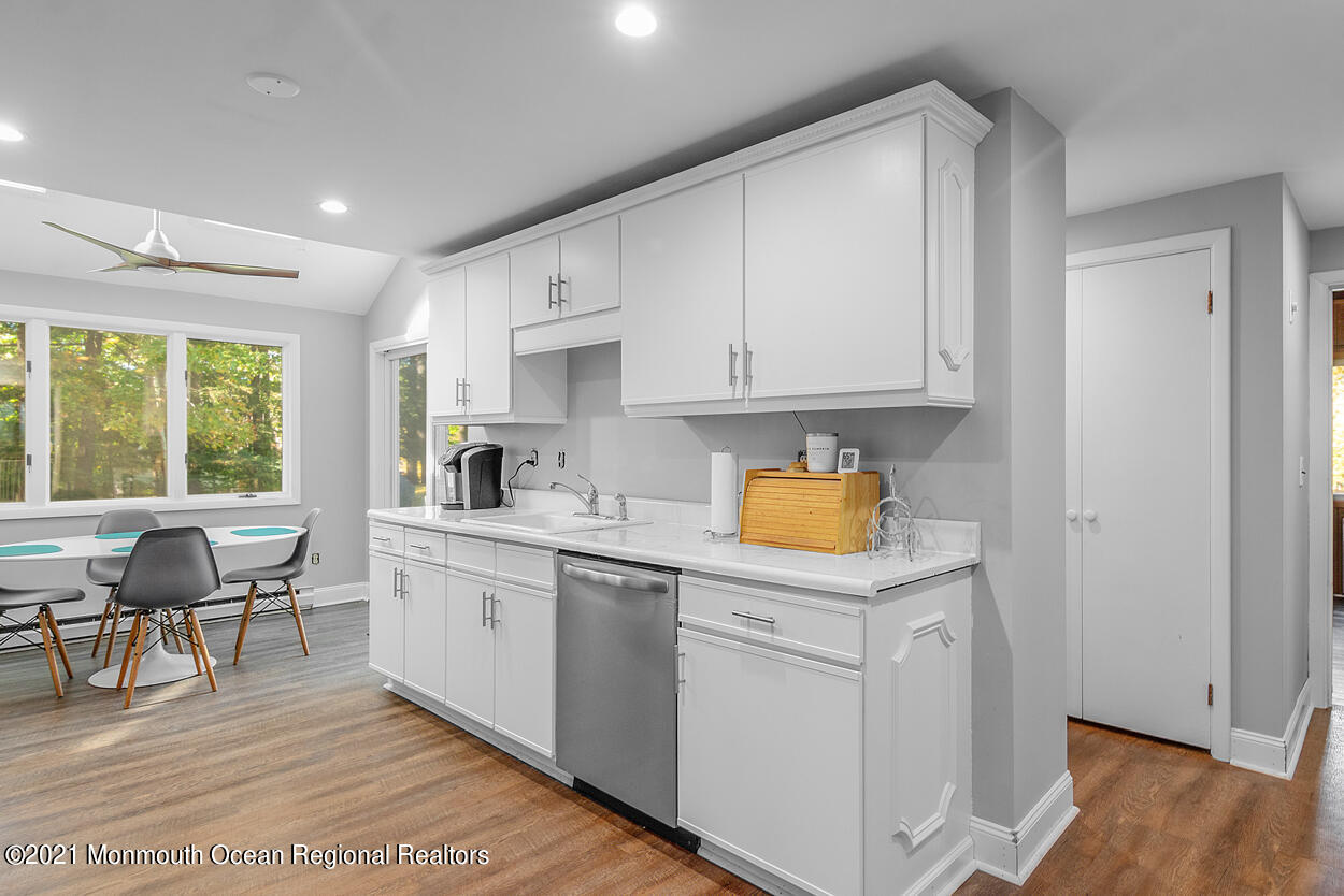 308 New Road Montague, NJ 07827 - Photo 6 of 27 a kitchen with a sink cabinets and wooden floor